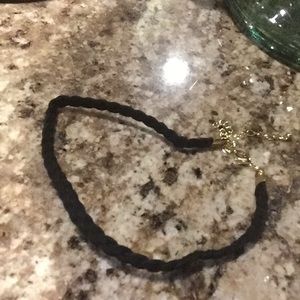 This is a choker a plain black choker